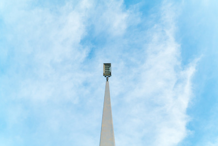 Low angle of electric lamppost at the street with blue skyの写真素材