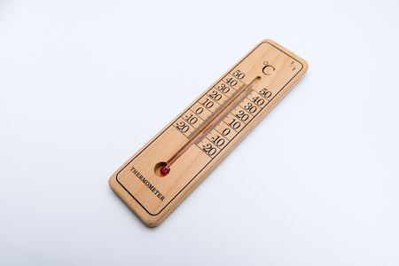 Wooden thermometer isolated on white background. Selective focusの写真素材