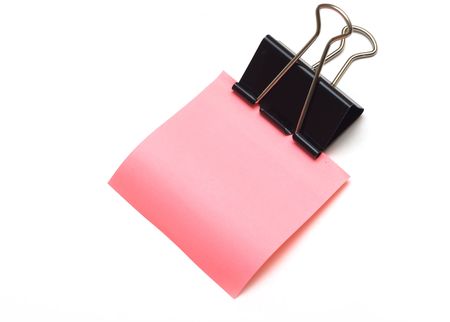 Pure pink sticker in a paper clip on the whiteの写真素材