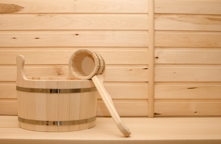Basin and ladle from a natural tree for a bathの写真素材
