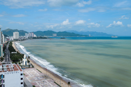 Cruise Ship Near Tropical Bay with Mountains in Nha Trang Vietnam 7 December 2025のeditorial素材