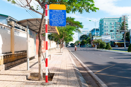 Vietnam Urban Public Transportation Bus Stop Sign with Route Map, Sunny City Street Scene in Nha Trang, Tourism and Commuting Concept, Nha Trang 20.12.2025 Vietnamのeditorial素材