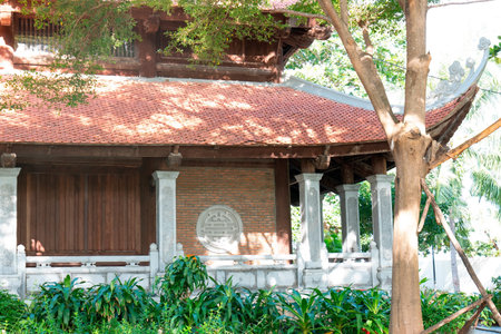 Traditional Vietnamese Pagoda Architecture with Red Tile Roof and Stone Carvings; Authentic Zen Atmosphere for Cultural Travel and Heritage Projects Nha Trang 20.12.2025 Vietnamのeditorial素材