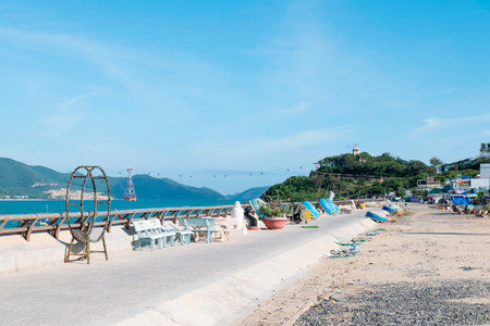Tropical Coastal Promenade in Vietnam with Traditional Basket Boats and Cable Car; Cinematic Wide Angle Landscape with Ample Copy Space and Natural Light Nha Trang 20.12.2025 Vietnamのeditorial素材