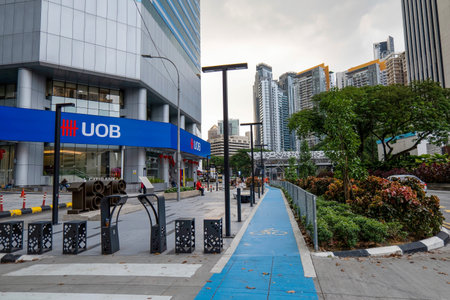 Modern Urban Landscape with UOB Bank Building and Blue Bicycle Lane in Kuala Lumpur 29.01.2026...