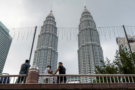 Petronas Twin Towers Landmark in Kuala Lumpur Malaysia with People in Foreground Kuala Lumpur 29.01.2026 Malaysiaのeditorial素材