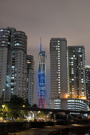 Majestic Merdeka 118 Skyscraper and Modern Apartment Buildings Illuminated at Night in Kuala Lumpur...
