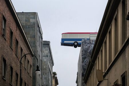 Turin, Italy -november 1 2019, bus on the roof of a building in Turin, is an artistic installation that pays tribute toのeditorial素材