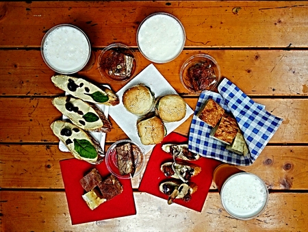 Finger food on a wooden tableの写真素材