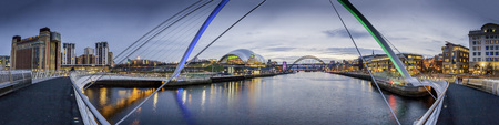The Gateshead Millennium Bridge is a pedestrian and cyclist tilt bridge spanning the River Tyne in...