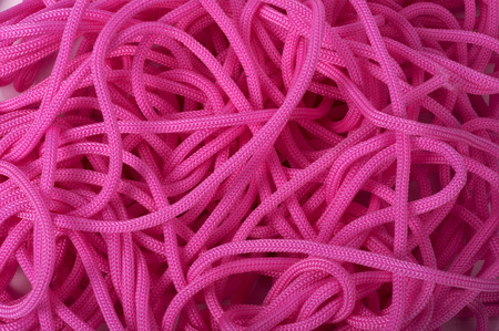 detail of pink rope resting in coil