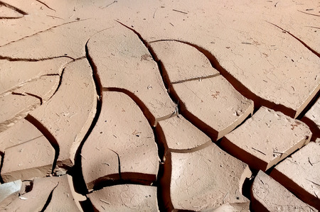 clay cracked and dried texture backgroundの写真素材