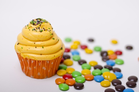 Vanilla cupcake with chocolate-coloredの写真素材