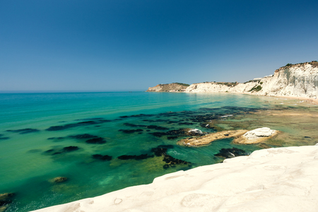 Scala dei Turchi is a fascinating limestone rock steep on a wonderful sea near Agrigento in Sicily (Italy)の写真素材