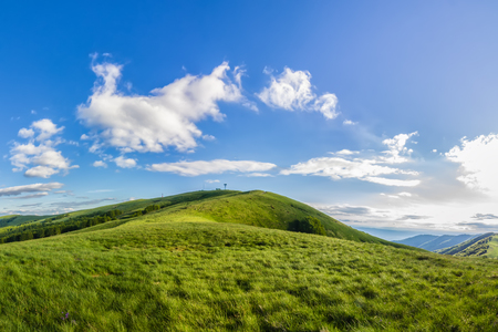 The summit of Mount Pratomagno in Tuscany (Italy). A particular mountain whose peak is constituted by a large lawn area with little vegetation.の写真素材