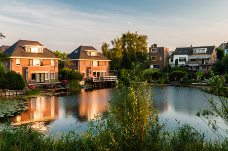 Dutch rural landscape with typical homesの写真素材