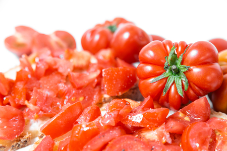 Bread oil and tomato. Appetizing very fresh food typical of the Mediterranean diet, seasoned with the addition of salt and pepper.
の写真素材