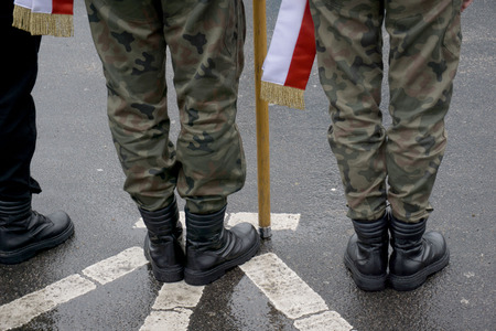 Boleslawiec Poland 5 February 2017 stands unidentified men in military uniforms with the flag during...