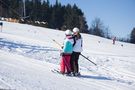 children on the ski liftの写真素材