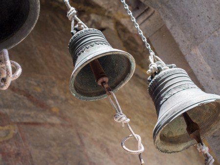 Bells of the Church of the Dormition in Vardzia cave city-monastery in Georgia の写真素材