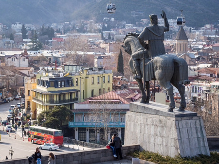 he old town of Tbilisi, the capital of Georgia, seen from the Metekhi church with the statue of King Vakhtang Gorgasali  The old town is a major tourist attraction のeditorial素材