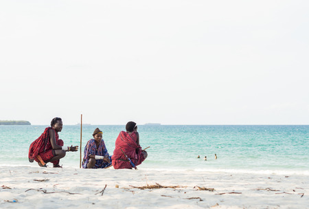 Men in traditional Masai clothes on South Beach in Dar es Salaam, the capital of Tanzania.のeditorial素材