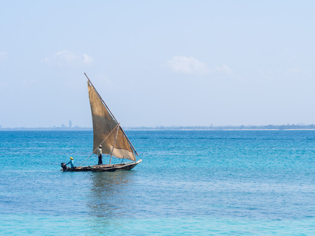 Fishermen on a dhow boat close to Mbudya Island in Tanzania, on a Sunday afternoon.
