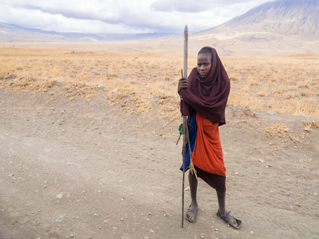 Young Maasai warriors on the road to Lake Natron. Ol Doinyo Lengai Mountain of God in the Maasai language in the background.のeditorial素材