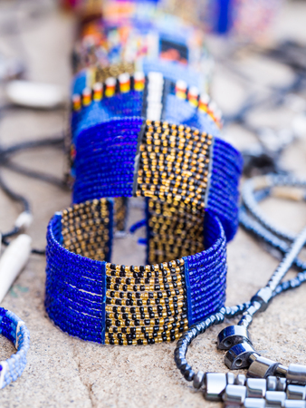 Maasai baracelet and other jewelry sold as souvenirs in Arusha Region, Tanzania, Africa.の写真素材