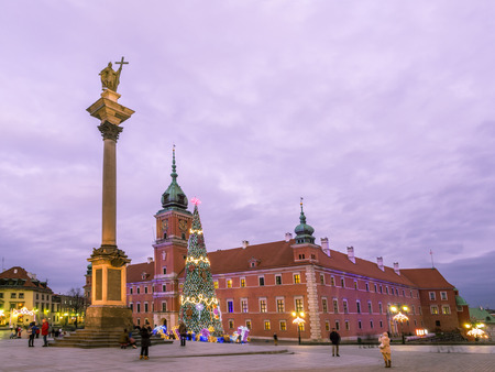 Castle Square in the Old Town of Warsaw, Poland in the early evening at Christmas time.のeditorial素材