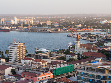 Architecture in downtown of Dar es Salaam, Tanzania, East Africa, in the evening, at sunset. Horizontal orientation, wide angle.のeditorial素材