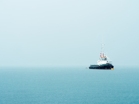 STONE TOWN, ZANZIBAR - APRIL 02, 2016: Boat close to Zanzibar during a heavy rain.の写真素材