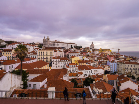 Cityscape of Lisbon, Portugal, seen from Portas do Sol, at sunset.のeditorial素材