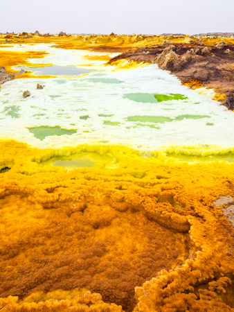 Mineral formations at sulphur lake Dallol in a volcanic crater in the Danakil Depression, northeast of the Erta Ale Range in Ethiopia. The lake with its sulphur springs is the hottest place on Earth.の写真素材