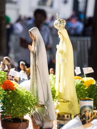 LISBON, PORTUGAL - JUNE 13, 2017: Devotional articles sold on the market in fron of Saint Anthony curch on Saint Anthony celebration in Lisbon.のeditorial素材