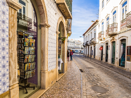 TAVIRA, PORTUGAL -MARCH 28, 2018: Street in the old town of Tavira in Algarve region, south of Portugal.のeditorial素材