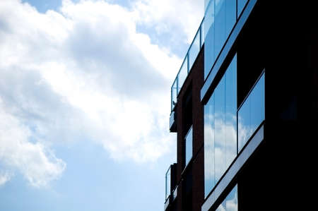 Architectural details of modern apartment building with reflections.の写真素材