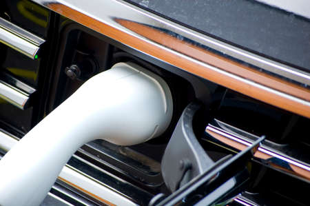 Recharging electric car by power cable.の写真素材