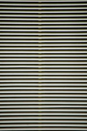 Window metal blind close up.