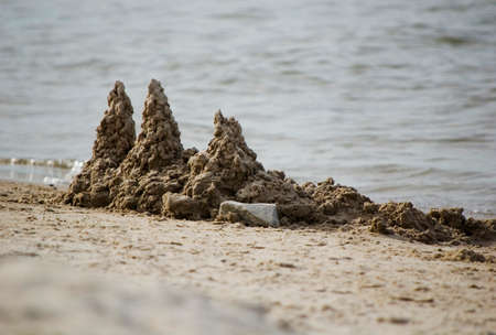 View of the sand building on the seashore. Selective focus.の写真素材