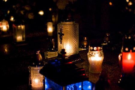 Votive candles burning on a cemetery.の写真素材