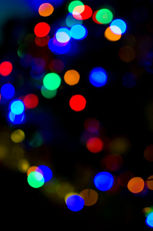 Christmas defocused decorated tree garlands.