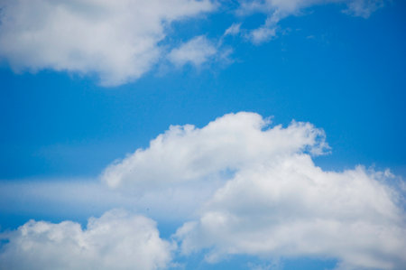White clouds and a blue sky.の写真素材