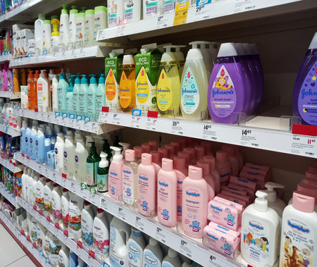 Poznan, Poland - 26 August 2023: Shelves in Rossmann drugstore.のeditorial素材