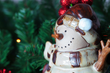 Christmas fir-tree is decorated with toys backgroundの写真素材