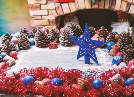 Beautiful decorated Christmas background. Stars and snow on a wooden background