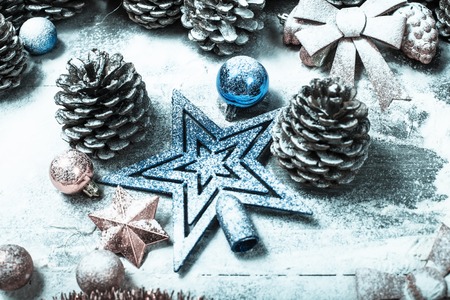 Old wooden background with falling snow flakes