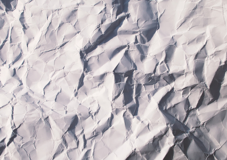 Paper crumpled texture. White dirty paper sheet.の写真素材