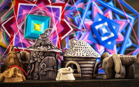 Knitted beautiful mandala. Two knitted tibetan mandala from threads, top view.の写真素材