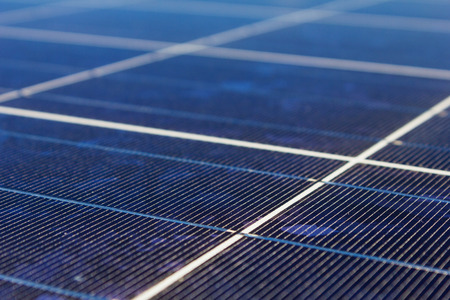 A roof with solar panels cells - detail  Solar panels producing clean and sustainable electricity ...